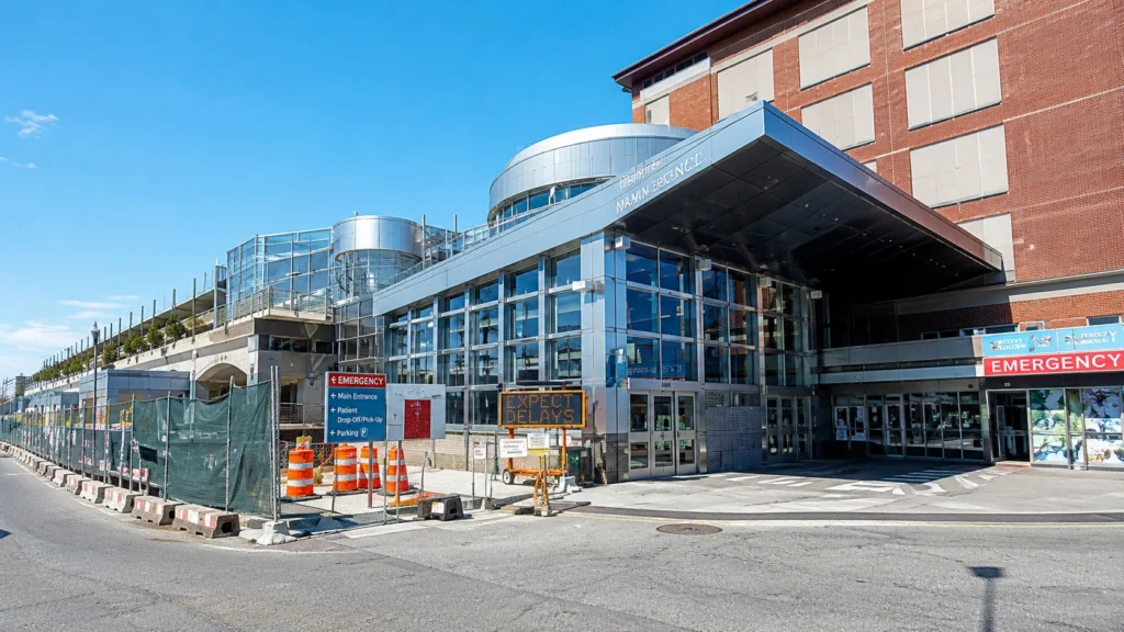 Hospital emergency entrance with modern architecture.
