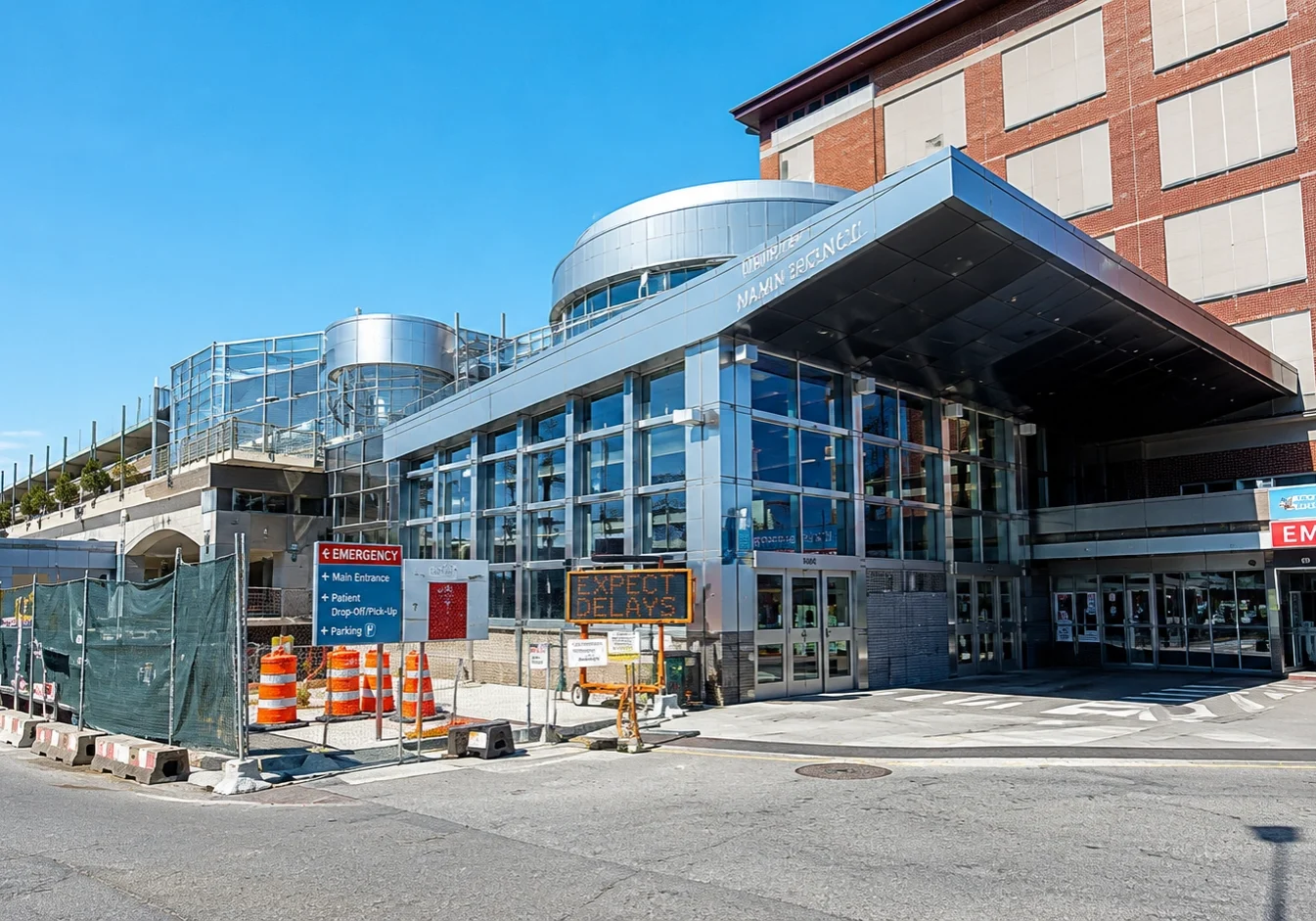 Hospital emergency entrance with modern architecture.